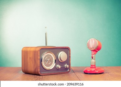 Retro Radio And Red Microphone On Table Old Style Photo