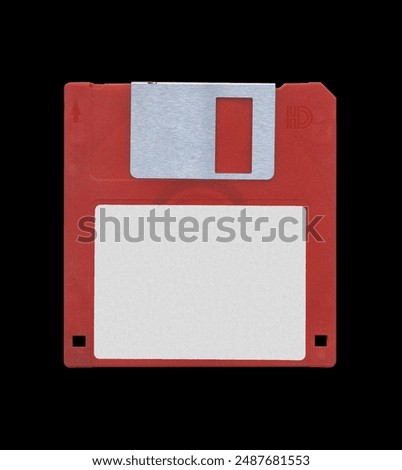 Retro 3.5” Red Floppy Disk mockup with white empty label sticker, disk on black background, old vintage storage png diskette