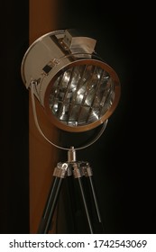 Retro Reflector With Turned Off Light On Tripod Indoors