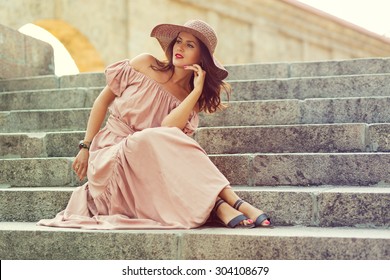 Retro Romantic Girl In The Long Dress Sitting On The Stair