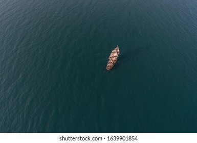 Retro Sailing Ship In Open Sea. Aerial Top View.