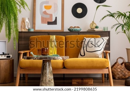 Retro and scandi style interior of living room with yellow sofa, mock up poster frame, coffee table, plants, commode, pillows, decoration and elegant personal accessories. Template. Cozy home decor.	