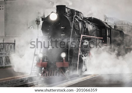 Retro steam train departs from the railway station.
