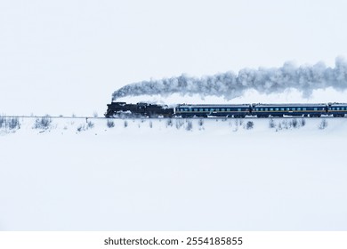 Retro steam train moves at winter morning. - Powered by Shutterstock