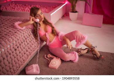 Retro style fashionable woman in pink