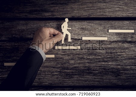 Retro style image of a successful businessman climbing the corporate ladder using paper cutouts.