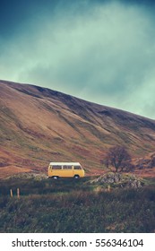 Retro Style Image Of A Vintage Campervan In The Scottish Wilderness