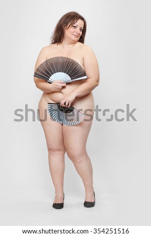 Retro Style Picture Of An Naked Overweight Woman With Folding Fan Retro Style Picture Of An Naked Overweight Woman With Folding Fan