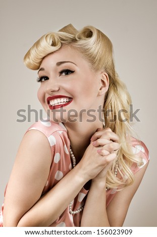 Retro style portrait of young happy woman