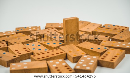 Retro styled or retro color pieces of wooden domino block. Concept of classic games. Slightly de-focused and close-up shot. Copy space.