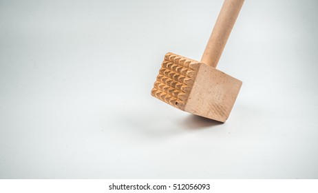 Retro Styled Or Retro Color Wooden Kitchen Hammer Or Crab Mallet. Slightly De-focused And Close-up Shot. Copy Space.