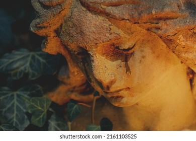 Retro Styled Image Of Beautiful Sensual Angel Crying As Symbol Of Pain, Death And Fear. Fragment Of An Ancient Statue. 