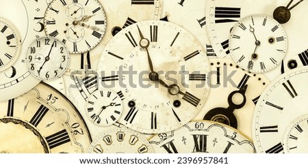 Retro styled image of a collection of vintage weathered clock faces