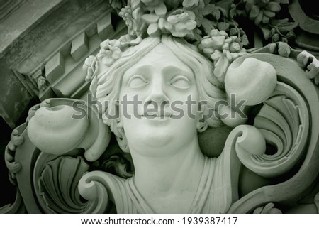 Retro styled image of Olympic goddess of love in antique mythology Aphrodite (Venus) Fragment of ancient statue. 