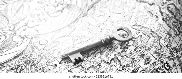 Retro Styled Key And Old White Nautical Chart Close-up. Vintage Still Life. Travel, Navigation, Collecting, Souvenir, Gift, Home, Accessories, Graphic Resource. Black And White Image