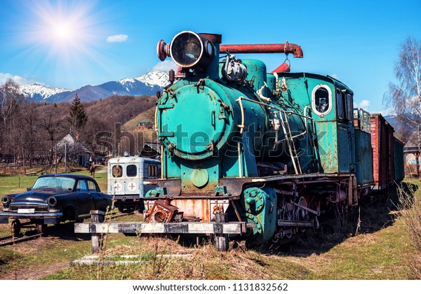 Retro\
styled side view of an old rusted steam\
locomotive