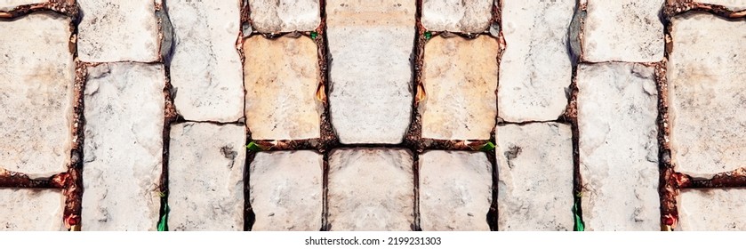 Retro Symmetrical Vintage Weathered Distressed Brick wall with Damaged Surface. Symmetrical Wide Web  Banner Backdrop or background. Panoramic Natural Pattern