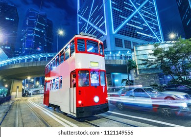 Retro Tram On The Evening City Street. Hong Kong.