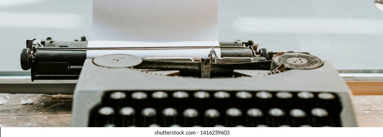 Retro Typewriter With A Piece Of Paper Mockup Website Banner Template