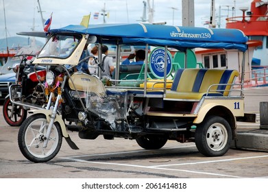 Retro vintage classic old motorcycle of driver ride service send receive thai people foreign travelers passenger travel visit on koh loy ko loi island at Sriracha on May 30, 2009 in Chonburi, Thailand