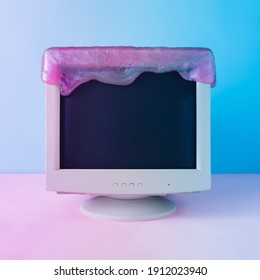 Retro Vintage Computer Monitor With Glitter Slime. Blue And Purple Colored Lights. Creative Minimal Cyberwave Background. Retro Futurism.