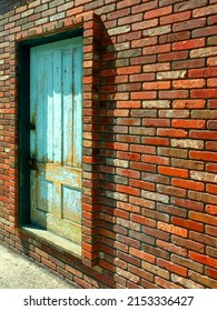 A Retro Vintage Red Brick Wall Wild West Bank Backdoor Building Door Rusty Entrance