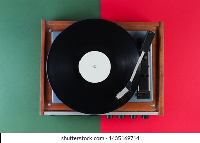 Retro Vinyl Record Player On Red Green Background