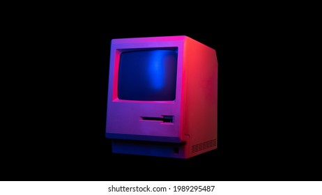 Retro wave 80s mac computer all-in-one illuminated by neon light isolated on black