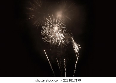 Retro White Holiday Fireworks Background With Sparks, Colored Stars And Bright Nebula On Black Night Sky. Amazing Beauty Colorful Fireworks Display On Celebration, Showing. Holidays Backgrounds