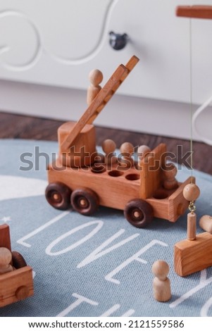retro wooden baby boy cars in the interior of nursery room
