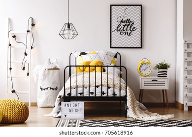 Retro Yellow Clock On White Bedside Cabinet In Creative Kids Bedroom With Poster On Wall