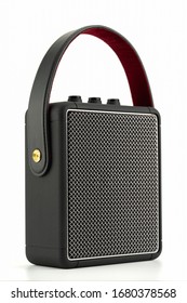 Retro-style Bluetooth speakers with volume keys and a sturdy metal grille. On a white background
