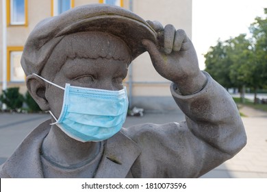 Return To School For Children And Students During COVID-19 Or Coronavirus Outbreak, Back To School With New Rules, Statue Of Child Wearing A Mask