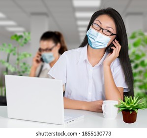 Return To Work After Covid-19 Quarantine. Busy Millennial Woman In Protective Mask Talking On Phone