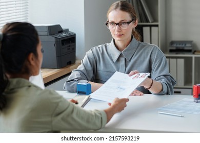 Returning Documents To Applicant At Office - Shutterstock ID 2157593219