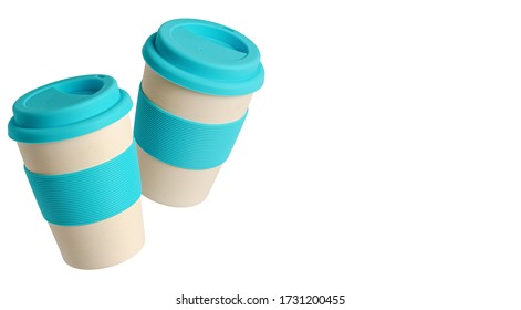 Reusable Bamboo Coffee Cup With Blue Silicone Holder And Lid. Isolated On White, Copy Space.