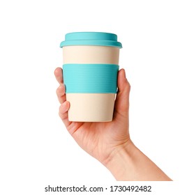 Reusable Bamboo Coffee Cup With Silicone Holder In Female Hand. Isolated On White. Zero Waste Lifestyle.