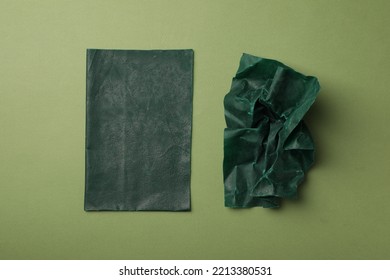 Reusable Beeswax Food Wraps On Green Background, Flat Lay