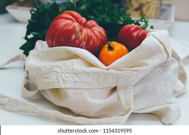 Reusable Canvas Grocery Bag With Red And Yellow Tomatoes And Spinach. Local Market Vegetables