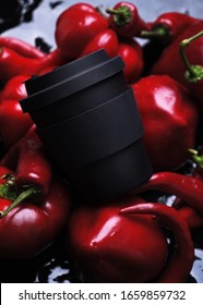 Reusable Coffee Eco Cup.  Black Cup With Red Pepper On Black Background. Spill Proof Travel Mug With Lid | Black. Keep Cup