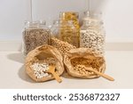 Reusable Containers And Bags Filled With Organic Beans, Chickpeas, And Lentils. Bulk Grains And Legumes For Eco-Conscious Consumption