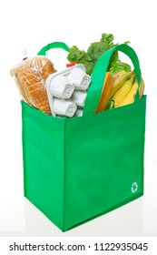 A Reusable Grocery Bag With Recycle Symbol, Filled With Basic Groceries.