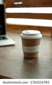 Reusable Keep Cup Of Coffee With A Silicone White Lid On The Table. Isolated