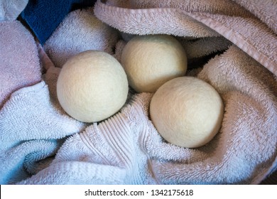 Reusable non-toxic wool balls are an alternative to dryer sheets for a great way to soften fabric, dry laundry faster, and save a little money.