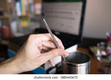 Reusable Stainless Steel Drinking Straw In A Hand