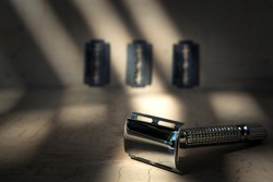 Reusable Steel Double Edged Eco-friendly Safety Razor On Minimalist Background With Shadows. Zero Waste And Sustainable Plastic Free Lifestyle