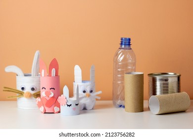 Reuse concept art from tin can, toilet tube, plastic bottle. Eco friendly bunny craft. Handmade decoration easter rabbit. Kids DIY ideas - Shutterstock ID 2123756282
