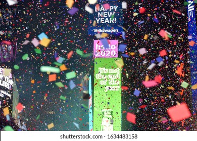 Revelers Celebrate After The Ball Drop During New Year's Eve Celebrations In Times Square On January 1, 2020 In New York City.