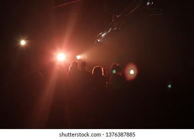 Revellers At A Warehouse Party Captured In Silhouette  