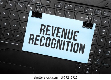Revenue Recognition Inscription On White Paper Note On Laptop Keyboard. Closeup Message.